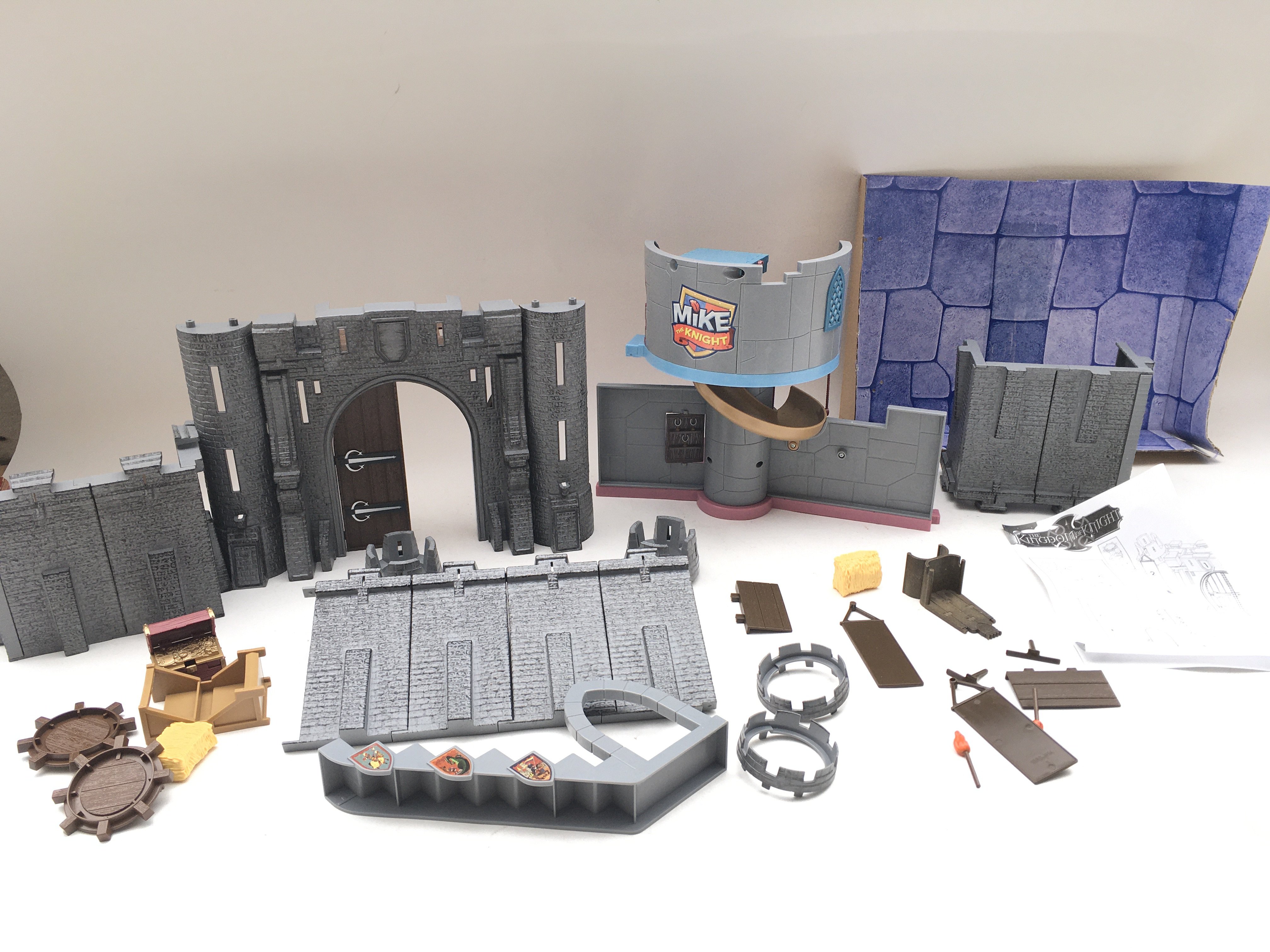 A kingdom of knight scene set and a part of mike the knight set.