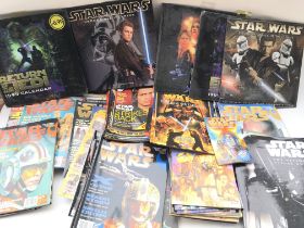 A Box Containing A Collection of Star Wars Insider Magazines.calendars etc.