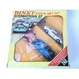 A Boxed Dinky Toys International GT Gift Set #246. Box is worn.