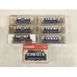 A Boxed Fleischmann N Gauge Track Cleaning Locomotive with 6 Carriages.