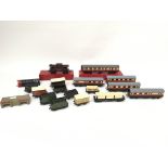 A collection of various TTR coaches and rolling stock including a boxed Trix Twin coach and 3rd