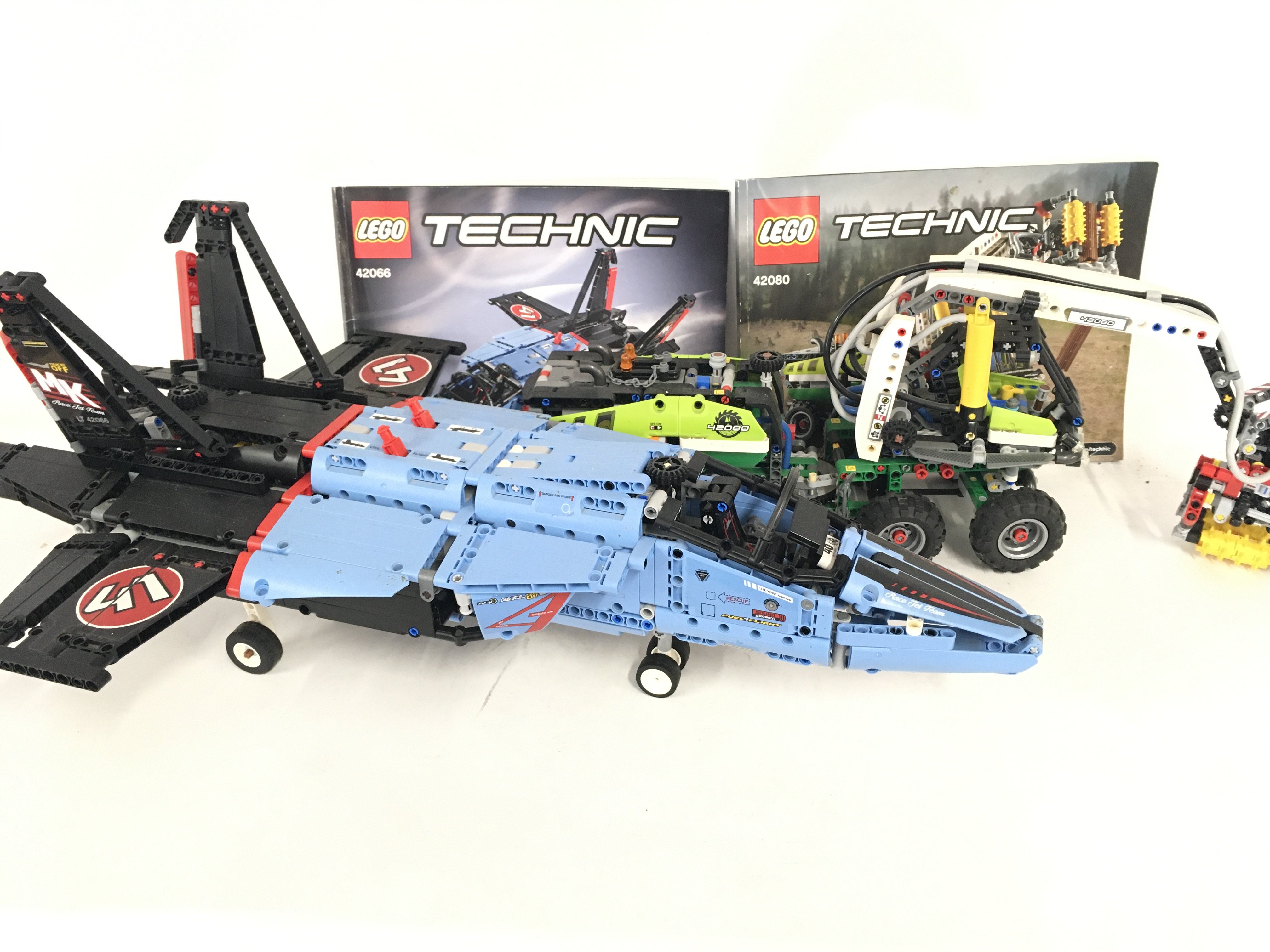 A Lego Technics Air Race Jet #42066 and a Forestry