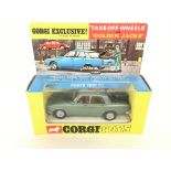 A Boxed Corgi Toys Take Off Wheels and Golden Jack