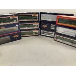 A Collection of Boxed 00 Gauge Coaches including Bachmann and Tri-Ang.