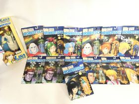 A Collection of Carded Robotech Figures including