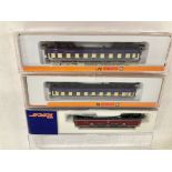 A Boxed Roco N Gauge BO-BO Diesel With 2 Arnold Rhiegold Coaches.