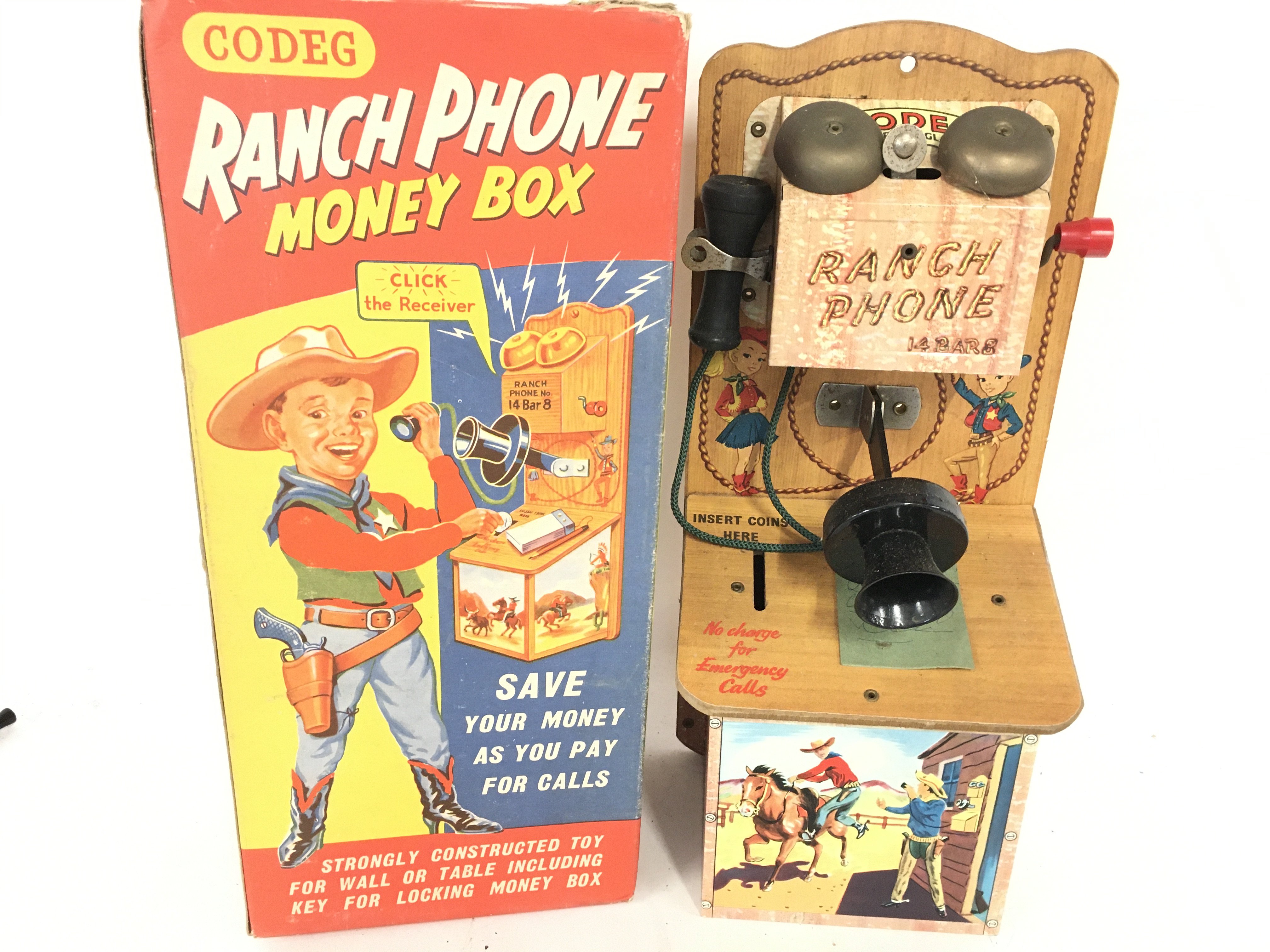 A Boxed Codeg Ranch Phone Money Box.