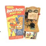 A Boxed Codeg Ranch Phone Money Box.