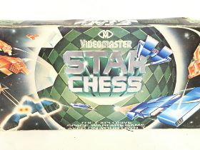 A Boxed Videomaster Star Chess.