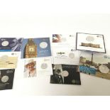 A collection of silver proof coins including three