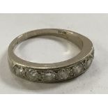 An 18ct white gold diamond ring. Ring size P