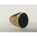 A 9carat gold ring set with an oval lntaglio ring