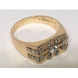 An 18carat gold ring set with a pattern of brillia