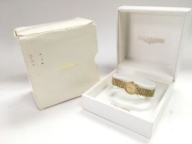 A boxed 9ct gold cased ladies Longines watch.