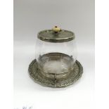 A good quality glass and silver plated biscuit barrel with flip top raised on a galleried base,