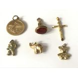 2 9ct gold teddy's/St Christopher & charms. Approx 11.7
