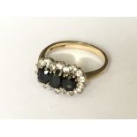 A 9ct gold 3 stone cluster ring