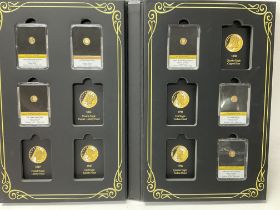 Gold Eagle replicas, 6 14K gold 0.5g miniature cas