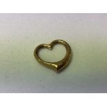 A 9ct gold Tiffany style heart pendant.
