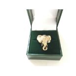 A 9ct gold ring in the form of an elephant. Size K