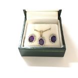 An 9ct gold amethyst necklace and earring set