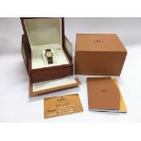 A boxed 18ct gold cased ladies Ebel watch with ass