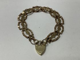 A 9ct gold heart design bracelet.