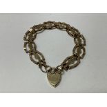 A 9ct gold heart design bracelet.