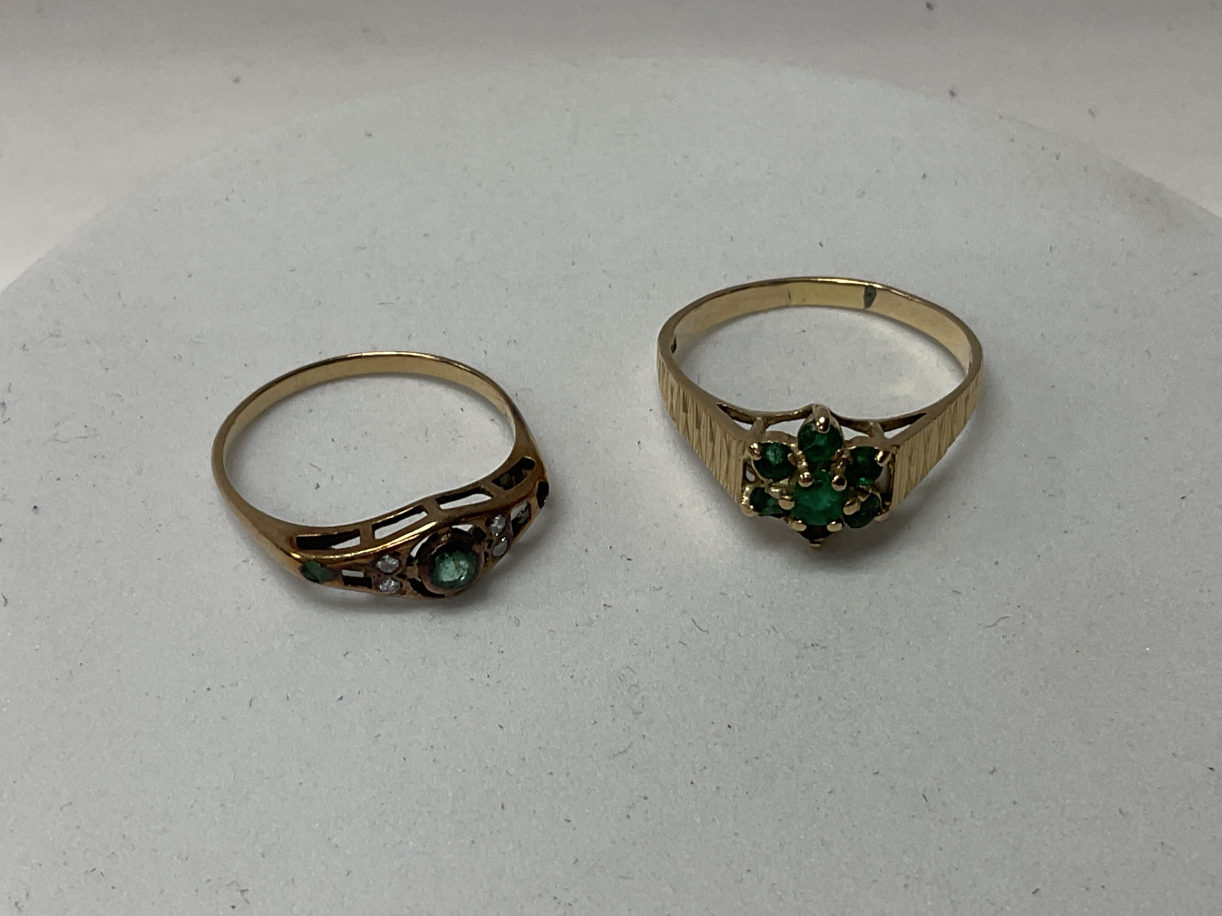 2 9ct gold emerald rings.