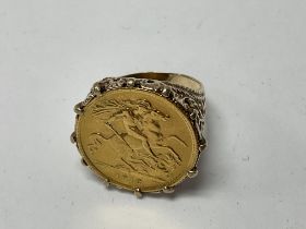 A 1912 half sovereign mounted on a 9ct gold ring m