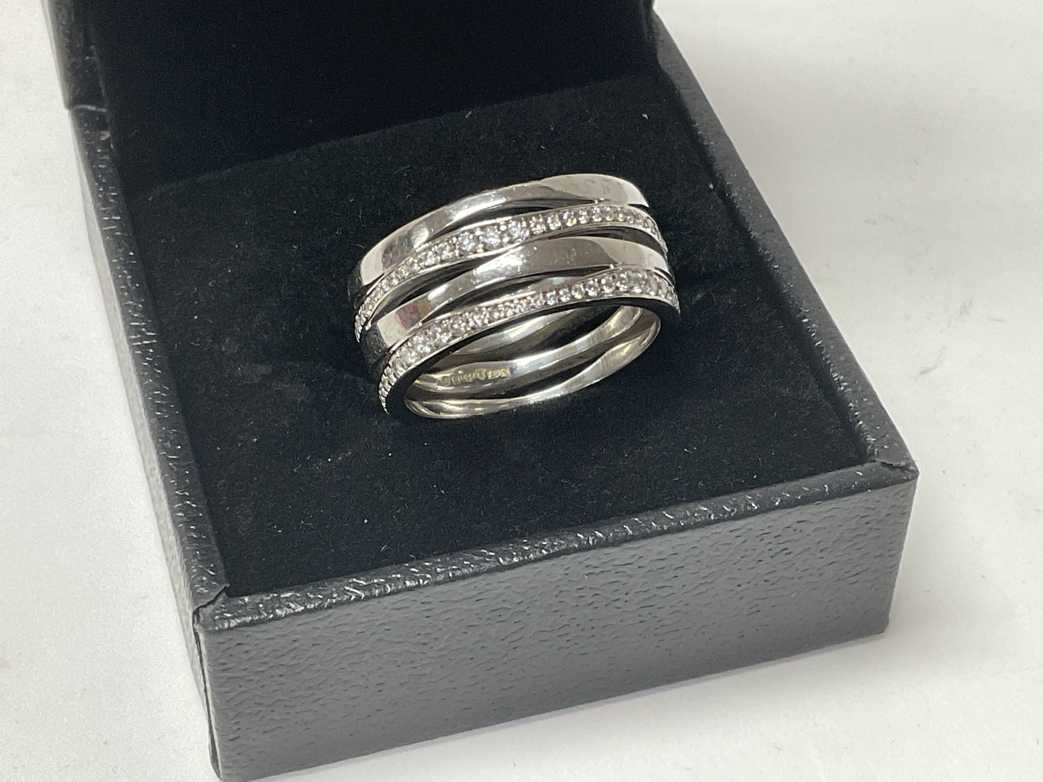 A Quality .950 Platinum and diamond eternity ring.