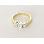 18ct yellow gold three stone Princess cut diamond