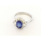 18ct white gold oval tanzanite and diamond cluster