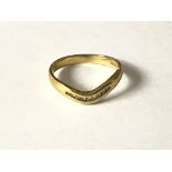 18 gold diamond wishbone ring. Approx 2.7g