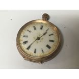 A 9carat gold button wind pocket watch with a deco