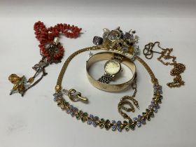 A small collection of mixed costume jewellery.