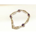 9ct gold and amethyst bracelet. Approximately 19cm