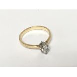 An 18carat gold ring set with a single Marquise di