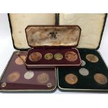 A collection of cased Guernsey and Jersey coin sets including 1956