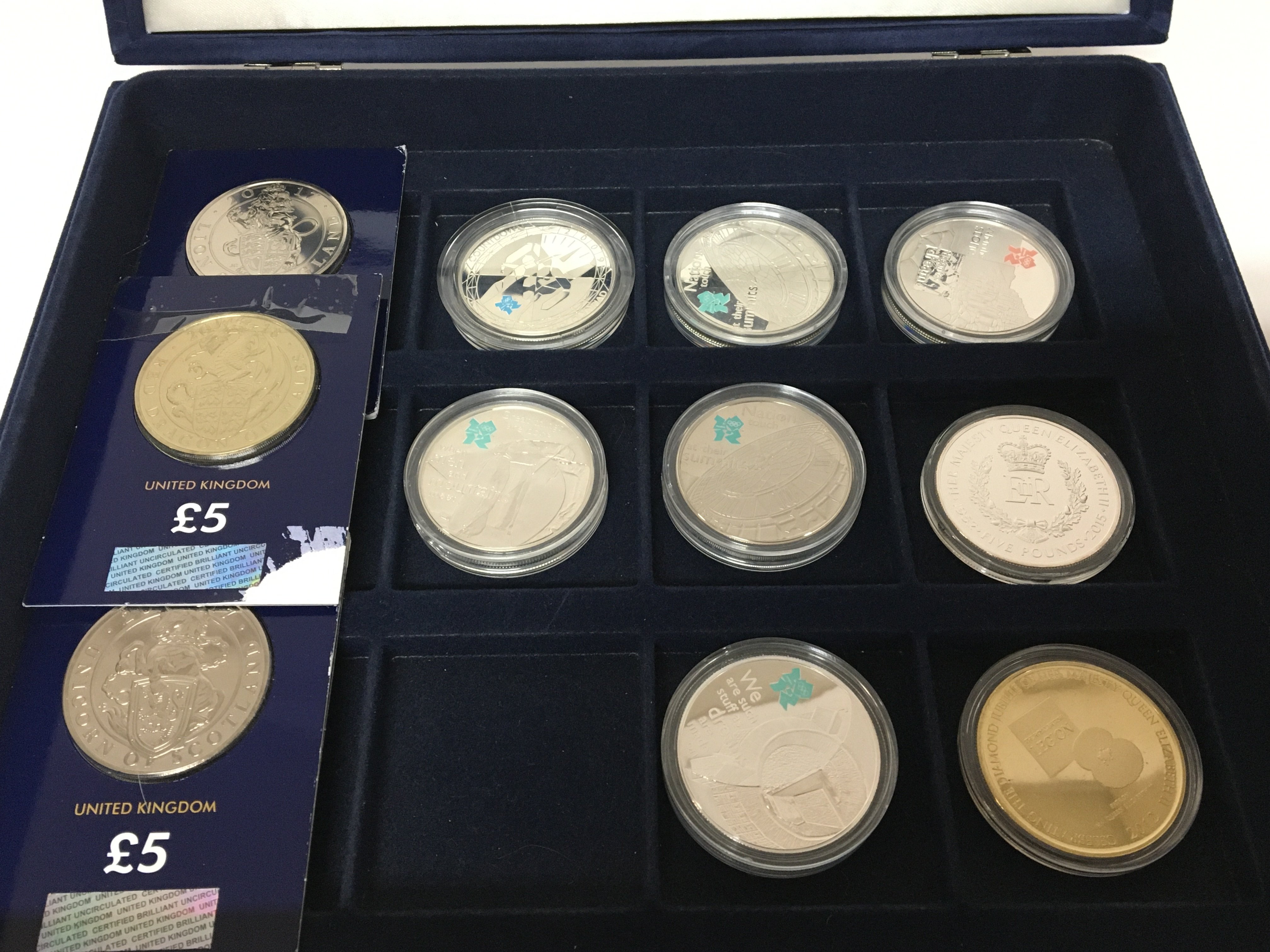 A collection of silver uncirculated Olympic coins