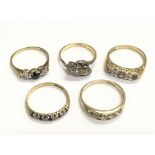 Five gold rings set with various stones, approx to