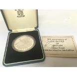 A Royal Mint silver commemorative medallion The 50
