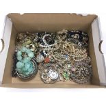 A box of costume jewellery.