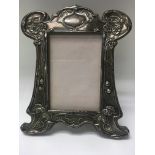 A silver photo frame of art Nouveau influences Bir