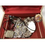 A box of silver jewellery