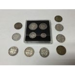 A George VI 1942 Maundy 4 coin set together with 9