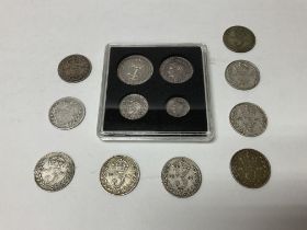 A George VI 1942 Maundy 4 coin set together with 9