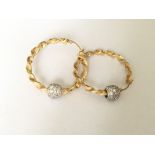 A pair of 9ct gold ball hoop earrings
