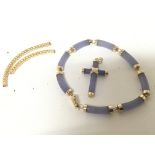 A Chinese 14carat gold and lavender jade bracelet