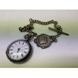A ladies silver pocket watch with silver Albert ch